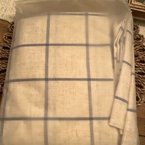 Curtain Rod Panels.  Cream and Blue Checkered curtain panels